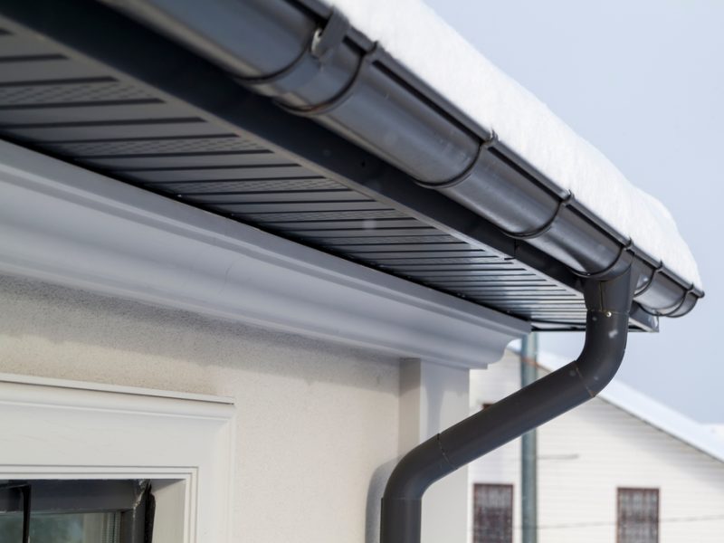 Corner,Of,The,House,With,New,Gray,Metal,Tile,Roof
