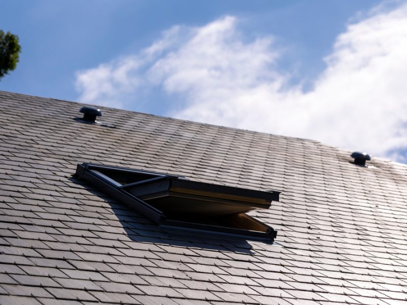 A,Portrait,Of,An,Opened,Skylight,Window,In,A,Slate