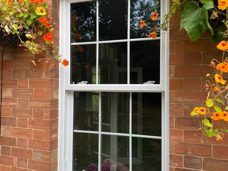 Sliding sash window with pretty flowers